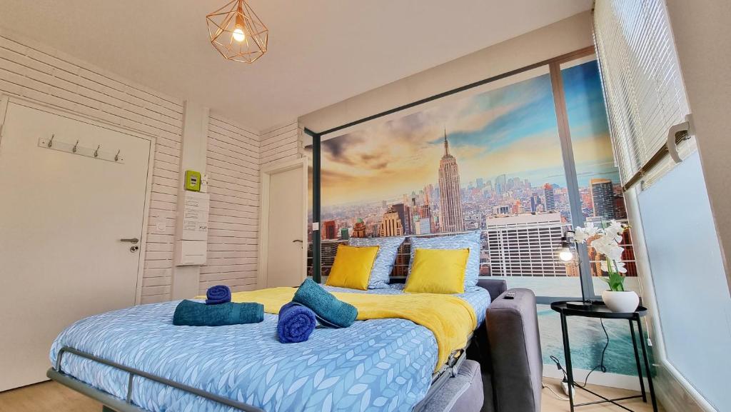 Posteľ alebo postele v izbe v ubytovaní La Résidence Évasion 2 - Original - Gare - Wifi - Relax BNB