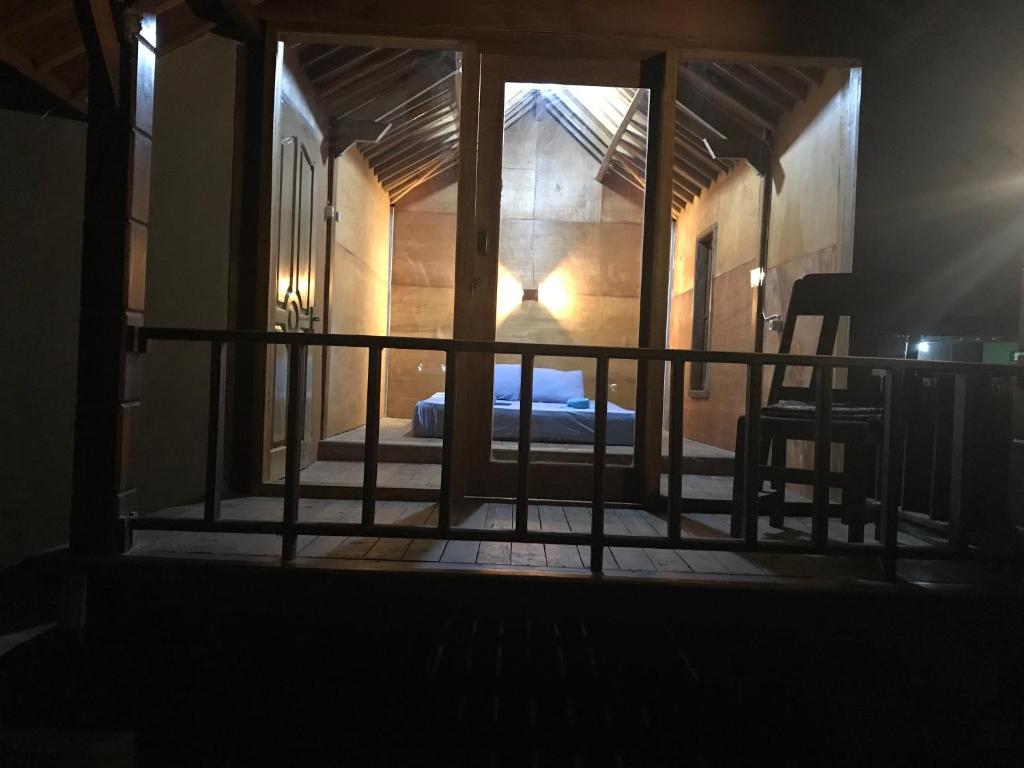 Postel nebo postele na pokoji v ubytování Muni's Lombok Bungalow