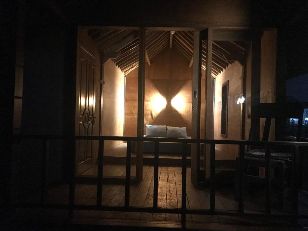 Balkón nebo terasa v ubytování Muni's Lombok Bungalow