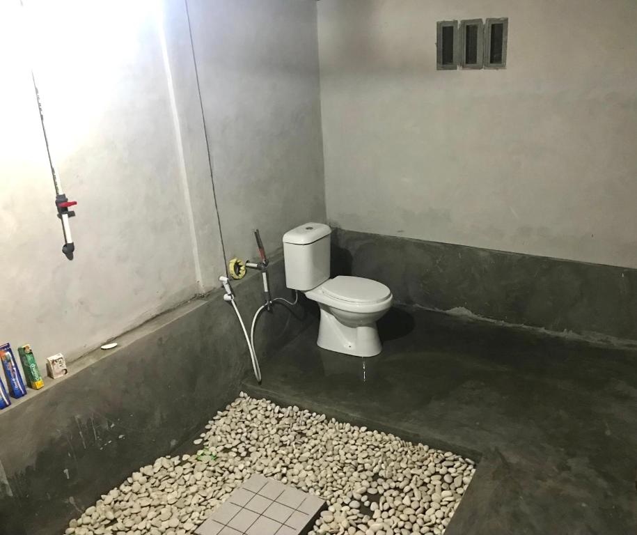Koupelna v ubytování Muni's Lombok Bungalow