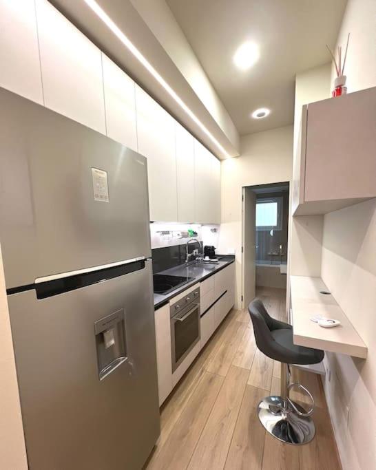 Kuchyň nebo kuchyňský kout v ubytování Home Donatella