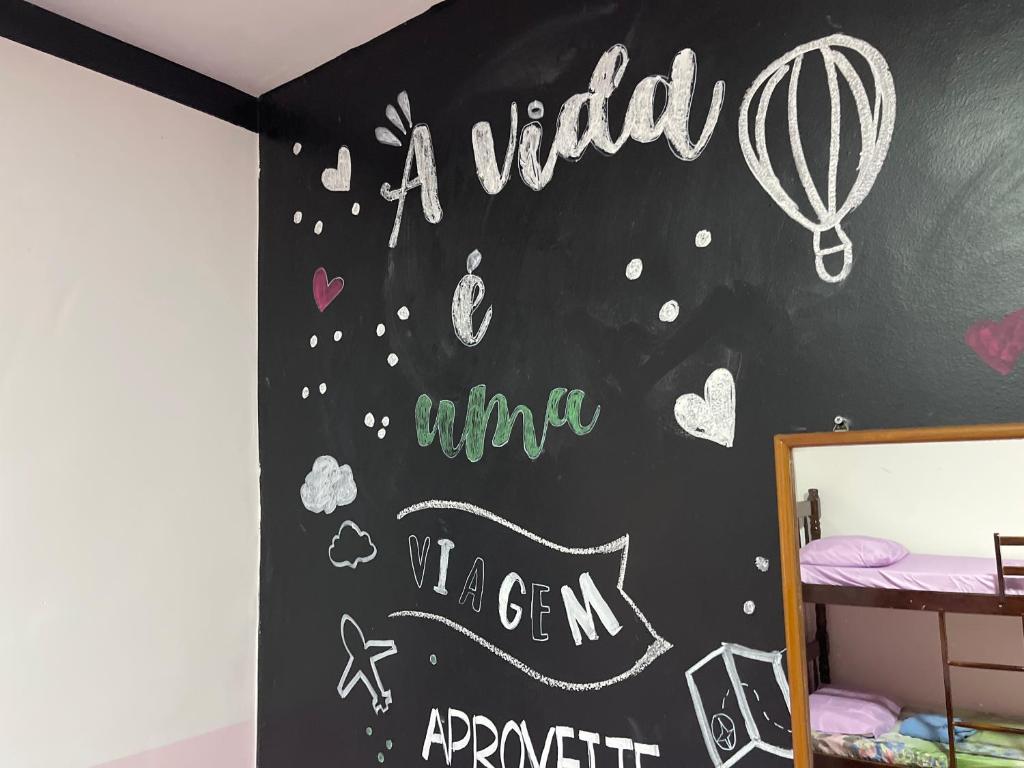 Postel nebo postele na pokoji v ubytování Toca da Mona Roots Hostel
