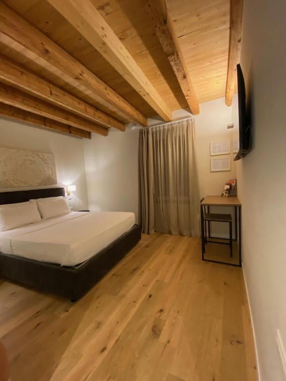 Posteľ alebo postele v izbe v ubytovaní Malvezzi24 Boutique Rooms