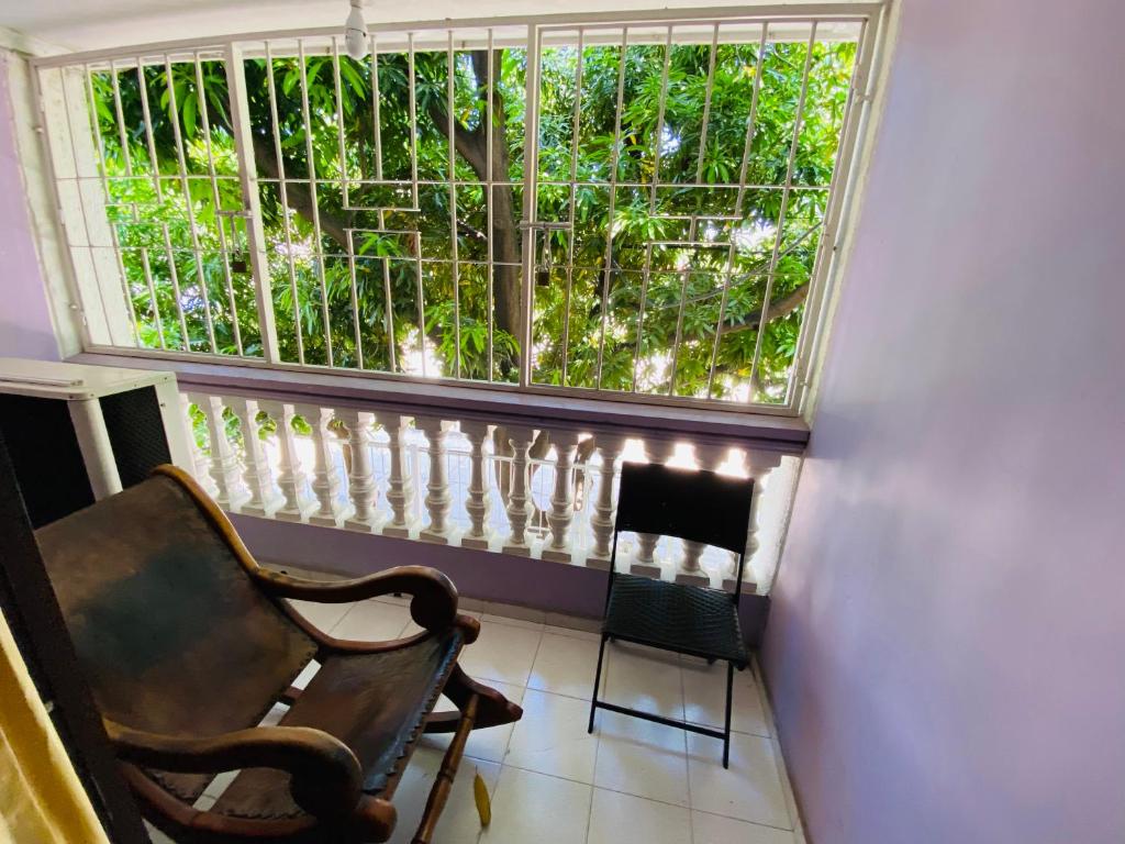 Rõdu või terrass majutusasutuses Casa Feliz Hostal