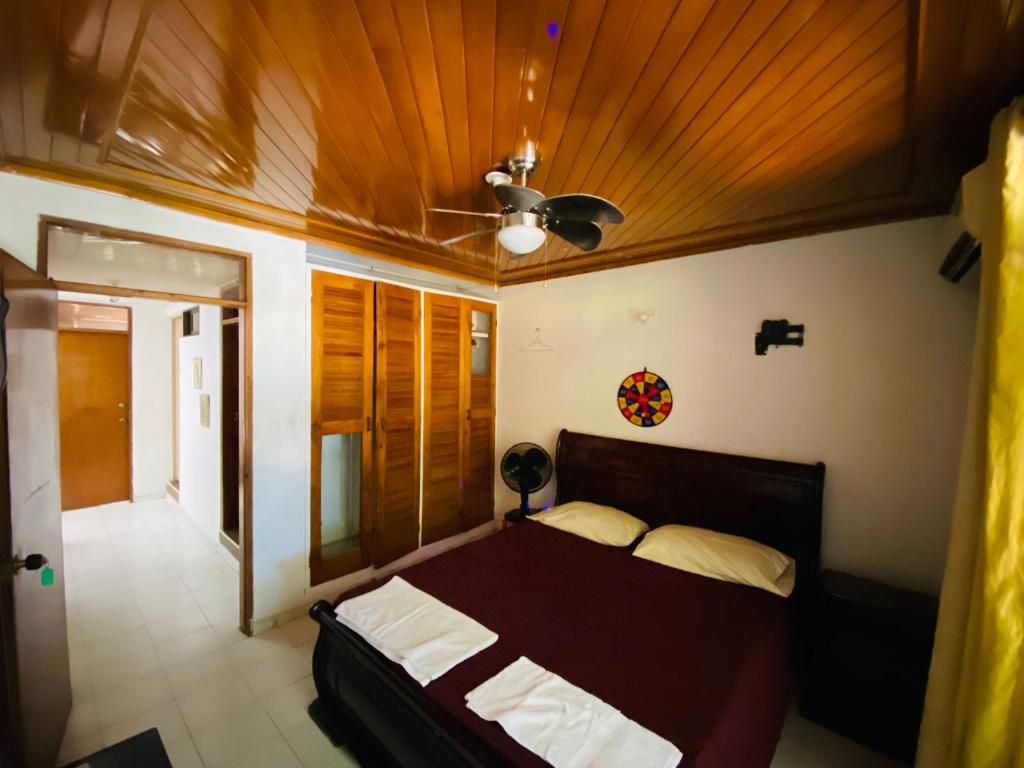 Voodi või voodid majutusasutuse Casa Feliz Hostal toas