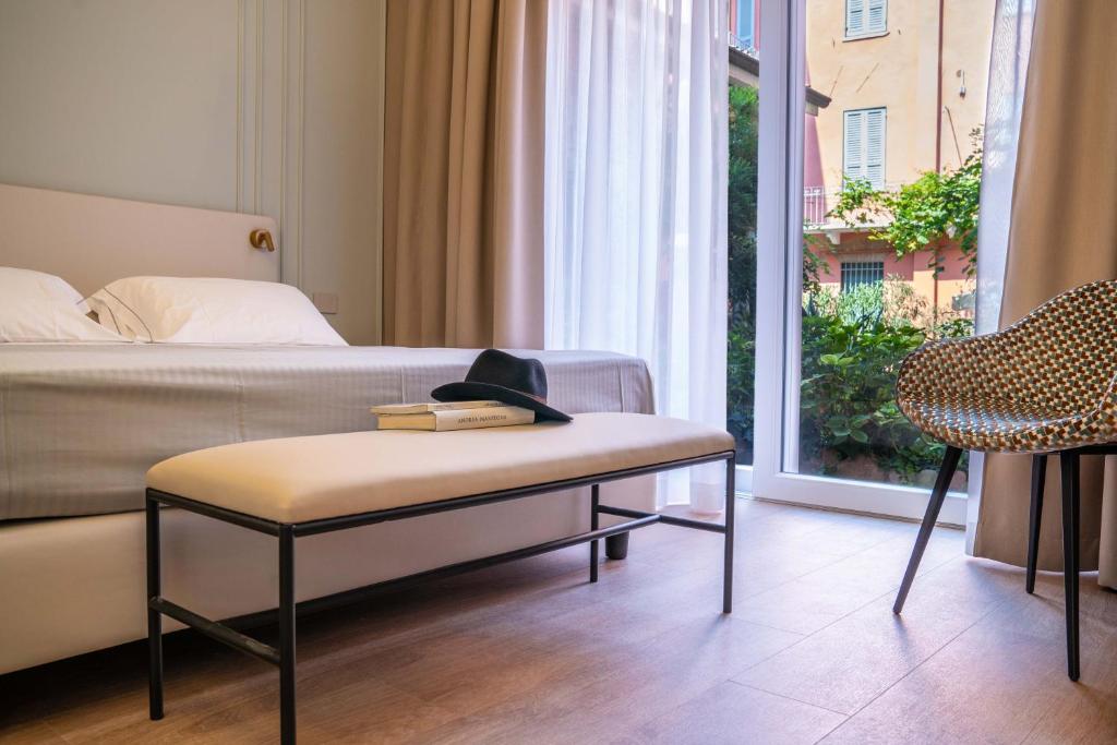 Łóżko lub łóżka w pokoju w obiekcie Albergo Bianchi Stazione