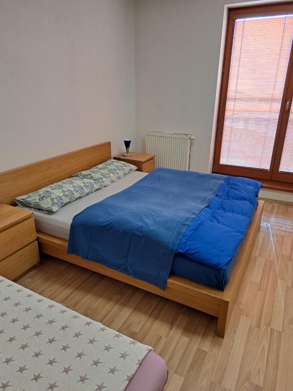 Postel nebo postele na pokoji v ubytování Apartament in the center of Poprad-free parking