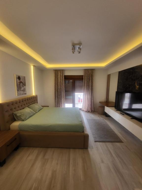 Postel nebo postele na pokoji v ubytování JOANDI Apartments Gevgelija