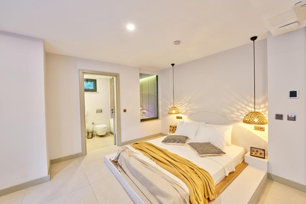 Postel nebo postele na pokoji v ubytování Lilium Boutique Hotel