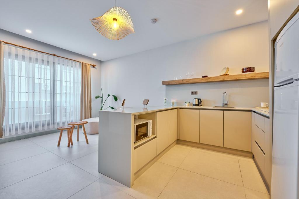 Kuchyň nebo kuchyňský kout v ubytování Lilium Boutique Hotel