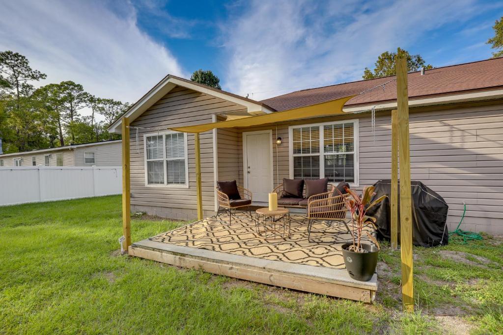 a house with a patio in the yard at Pet Friendly Casa Nueve St Augustine Home! in Saint Augustine