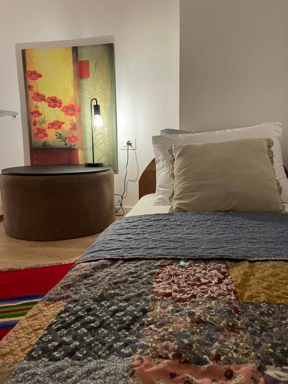 Postel nebo postele na pokoji v ubytování Quattro stagioni apartment