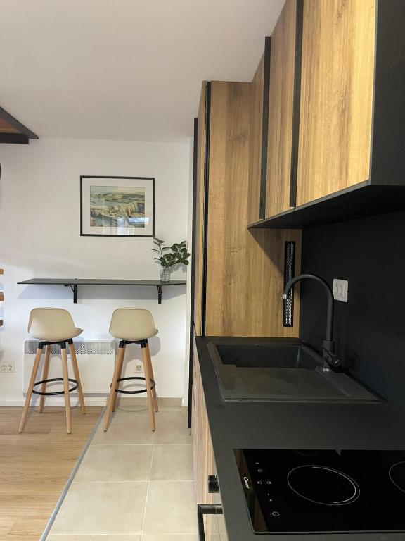 Kuchyň nebo kuchyňský kout v ubytování Quattro stagioni apartment
