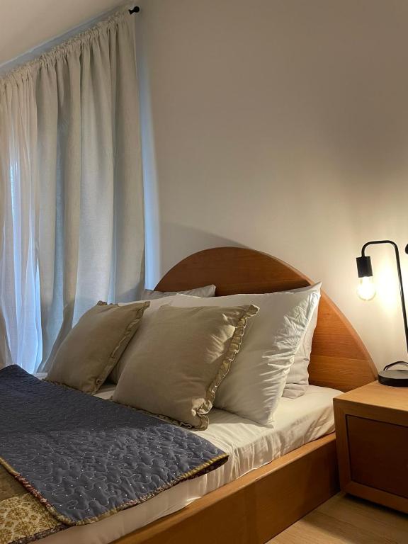 Postel nebo postele na pokoji v ubytování Quattro stagioni apartment