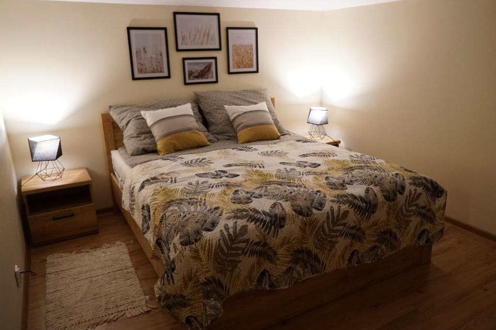 Posteľ alebo postele v izbe v ubytovaní GreenView Apartment