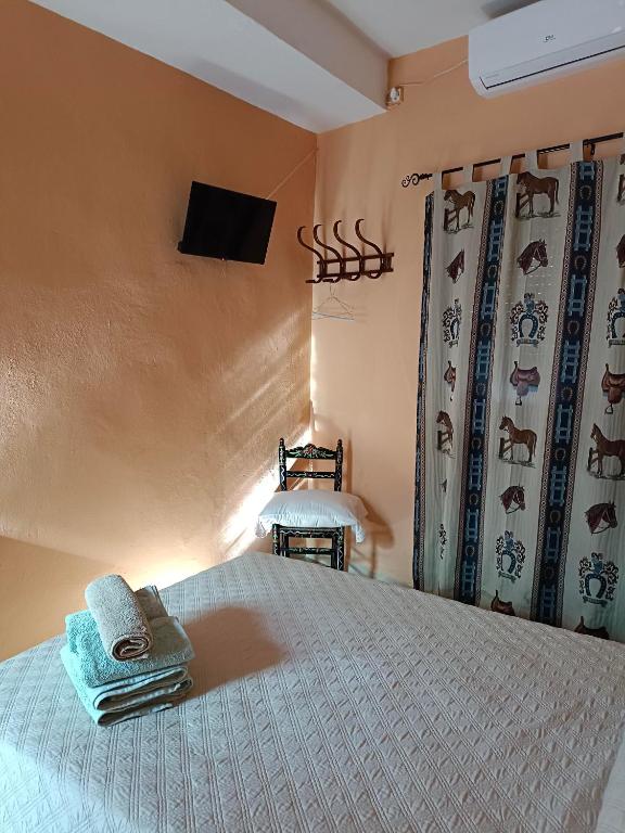 Posteľ alebo postele v izbe v ubytovaní Casa Rural Patio Rociero