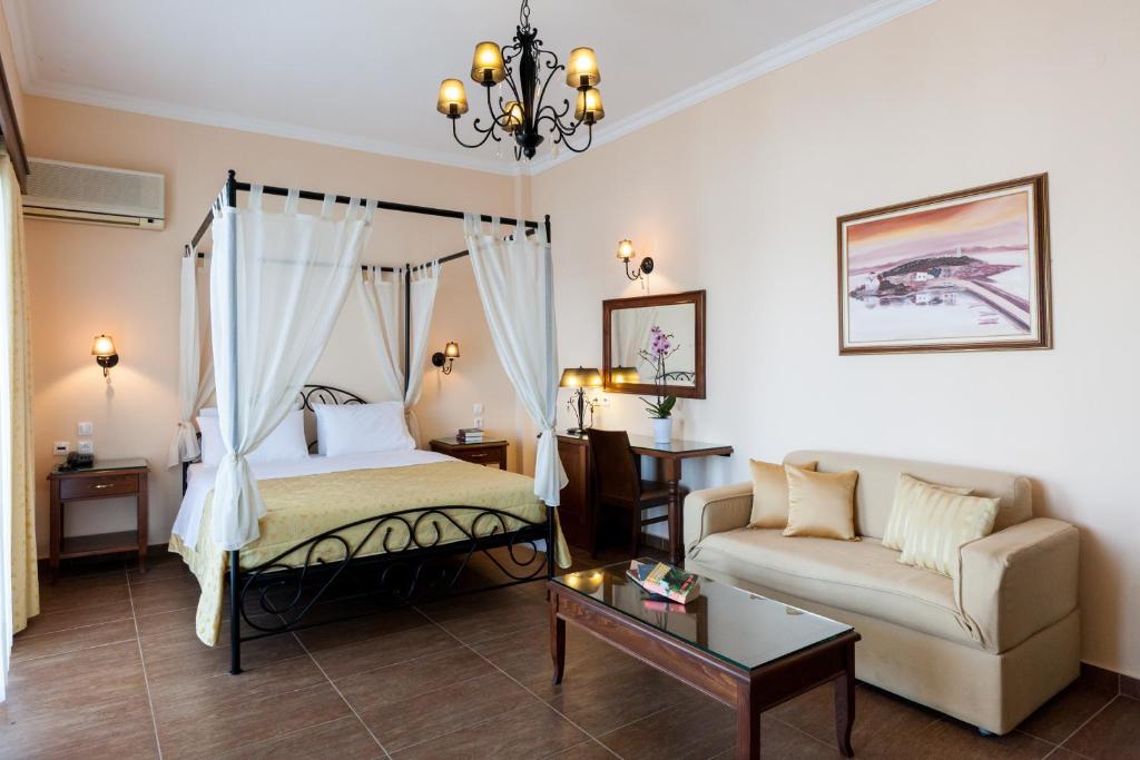Postel nebo postele na pokoji v ubytování Pantheon City Hotel