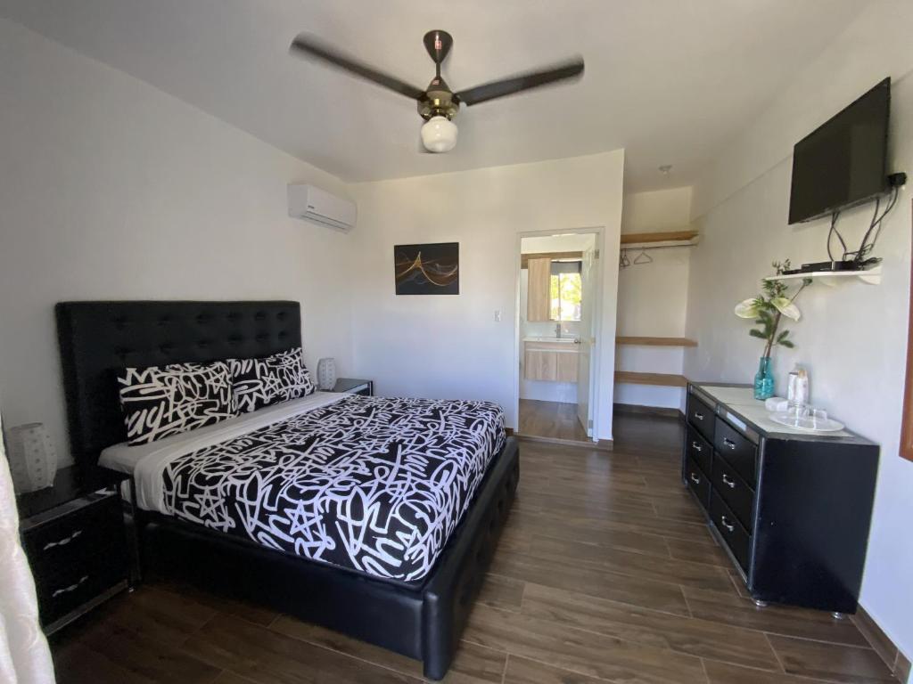 Postel nebo postele na pokoji v ubytování Diamond Hotel Cabarete