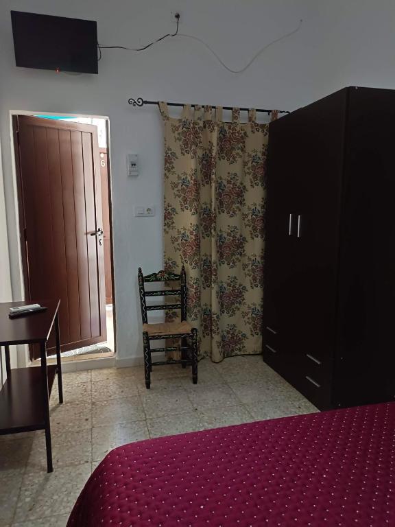 Posteľ alebo postele v izbe v ubytovaní Casa Rural Patio Rociero