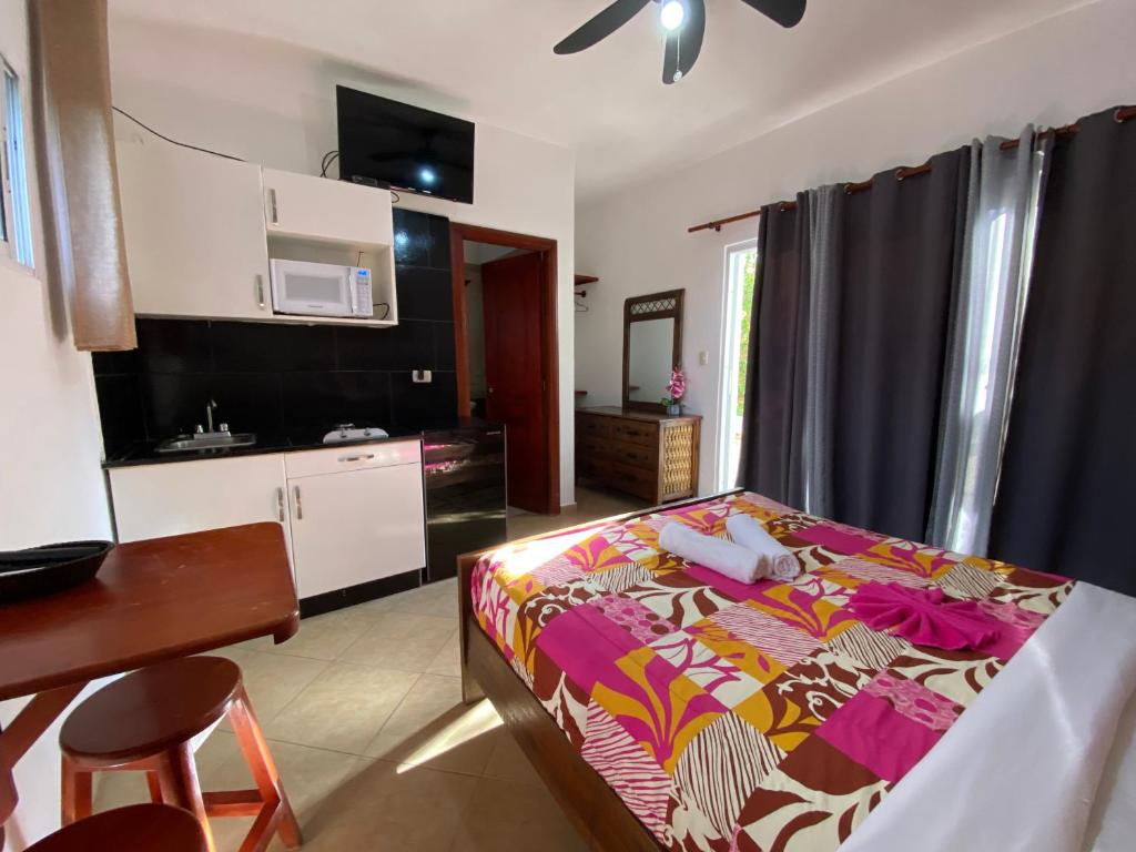 Postel nebo postele na pokoji v ubytování Diamond Hotel Cabarete