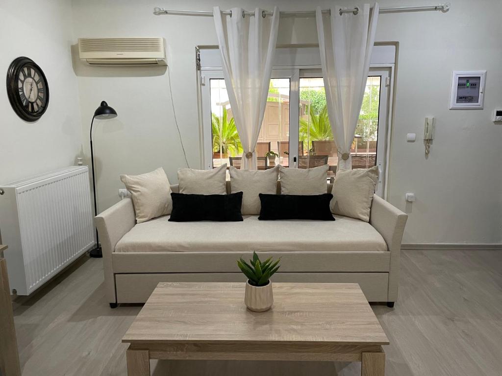 Posezení v ubytování Triptolemus Stay Inn