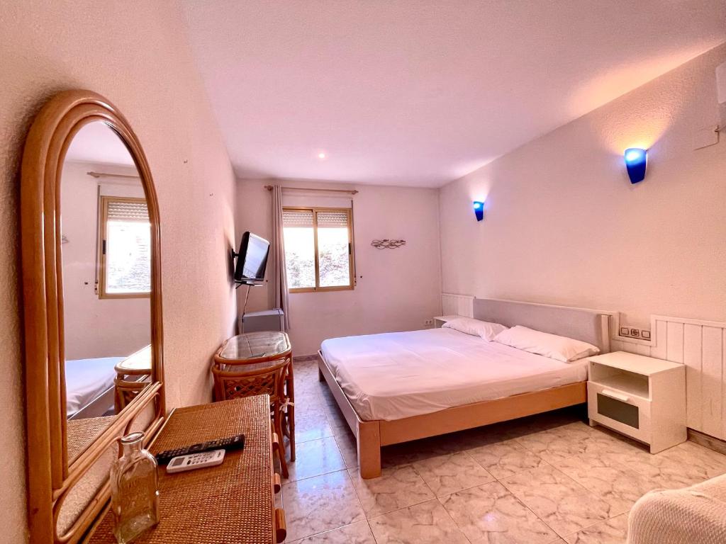A bed or beds in a room at CHINASOL Low Cost