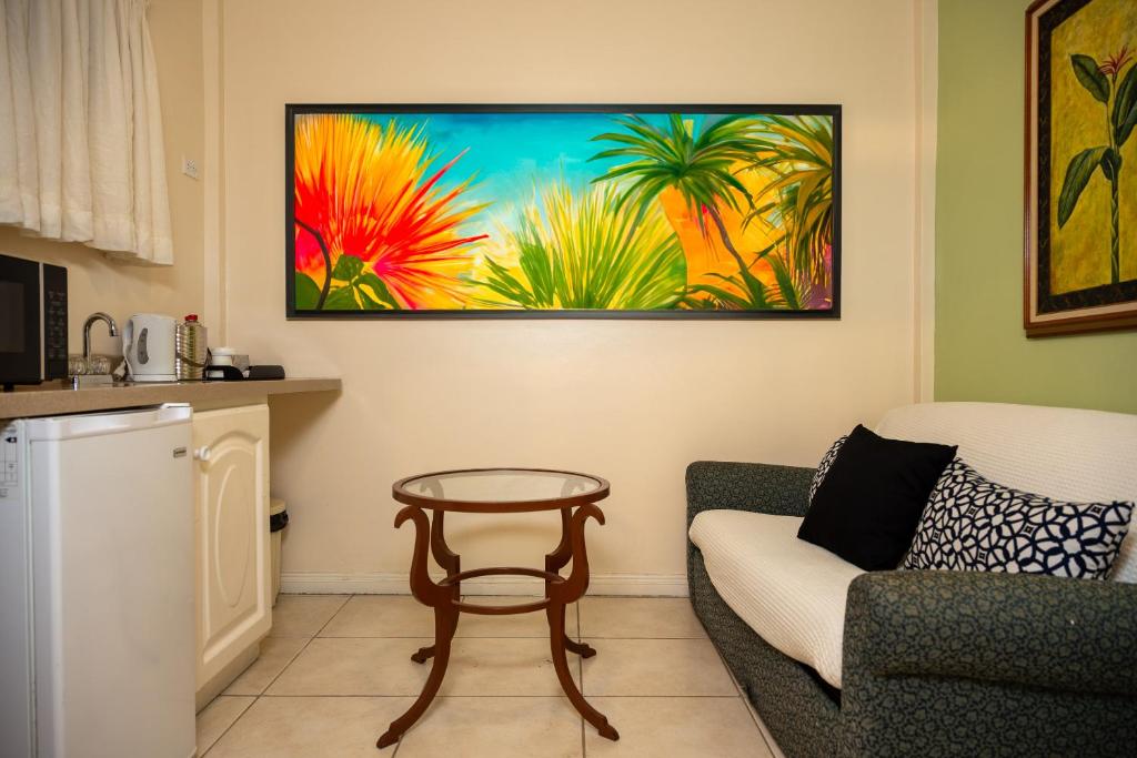 Grand Coastal Hotel - King Suite Con Balcón