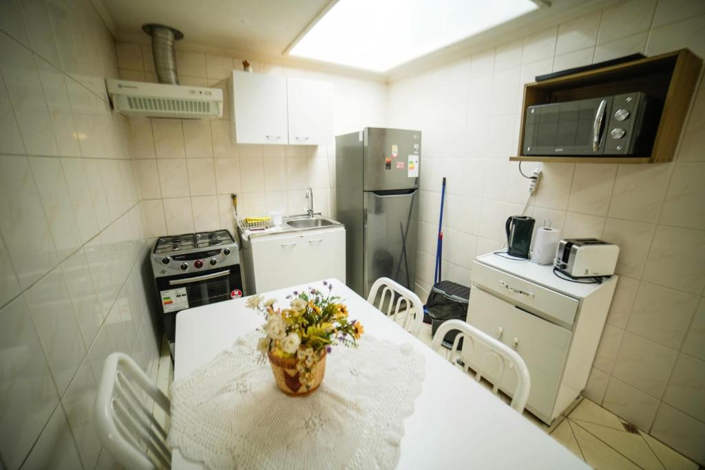 Kuchyň nebo kuchyňský kout v ubytování Departamentos Cordillera