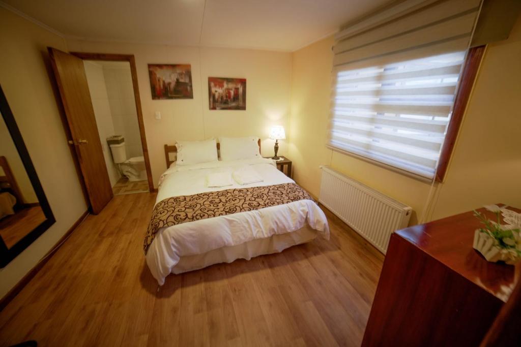 Postel nebo postele na pokoji v ubytování Departamentos Cordillera