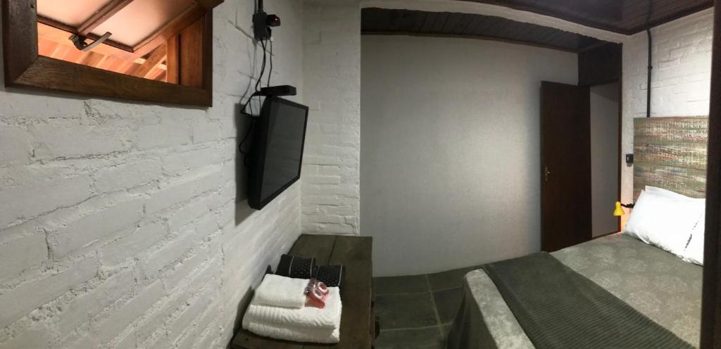 Postel nebo postele na pokoji v ubytování Pousada dos Adris