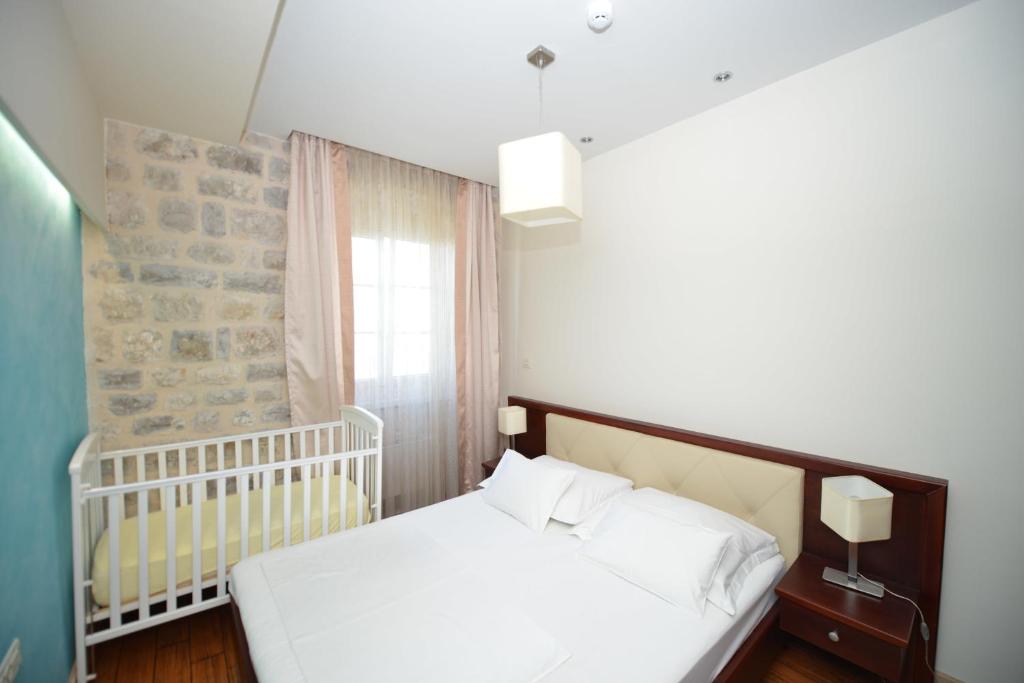 Krevet ili kreveti u jedinici u okviru objekta Vila Nikčević Apartments