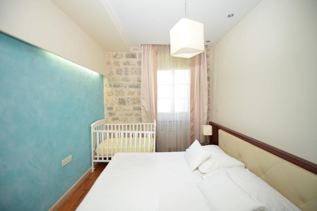 Krevet ili kreveti u jedinici u okviru objekta Vila Nikčević Apartments