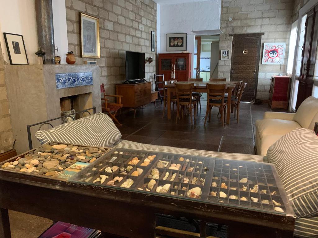 a living room with a table with cookies on it at IRUPE/Casa completa /pileta/cercana al rio in Paganini