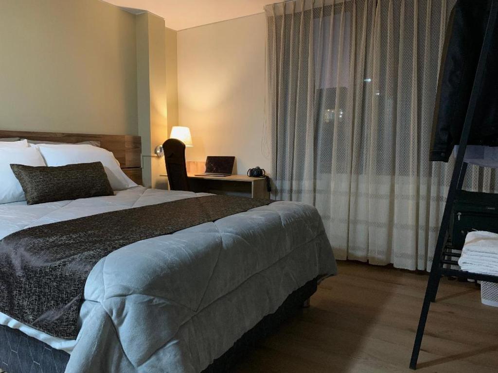 Cama ou camas em um quarto em Villa San José