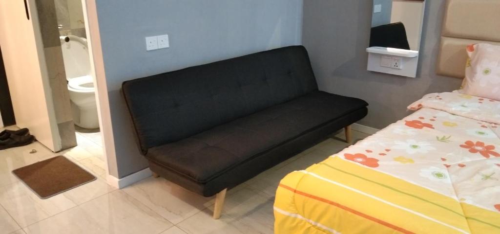 Postel nebo postele na pokoji v ubytování Pintarman Service Apartment