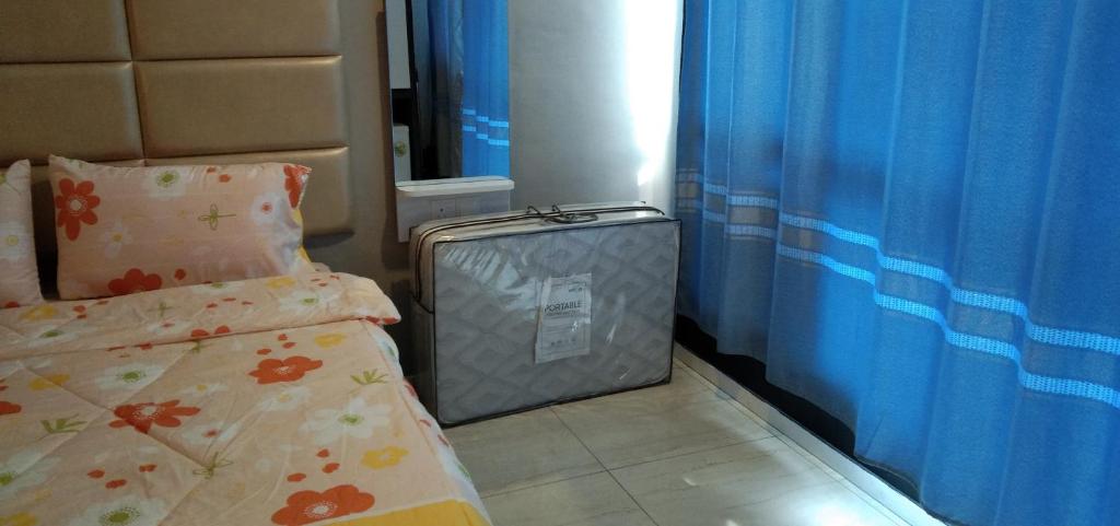 Postel nebo postele na pokoji v ubytování Pintarman Service Apartment