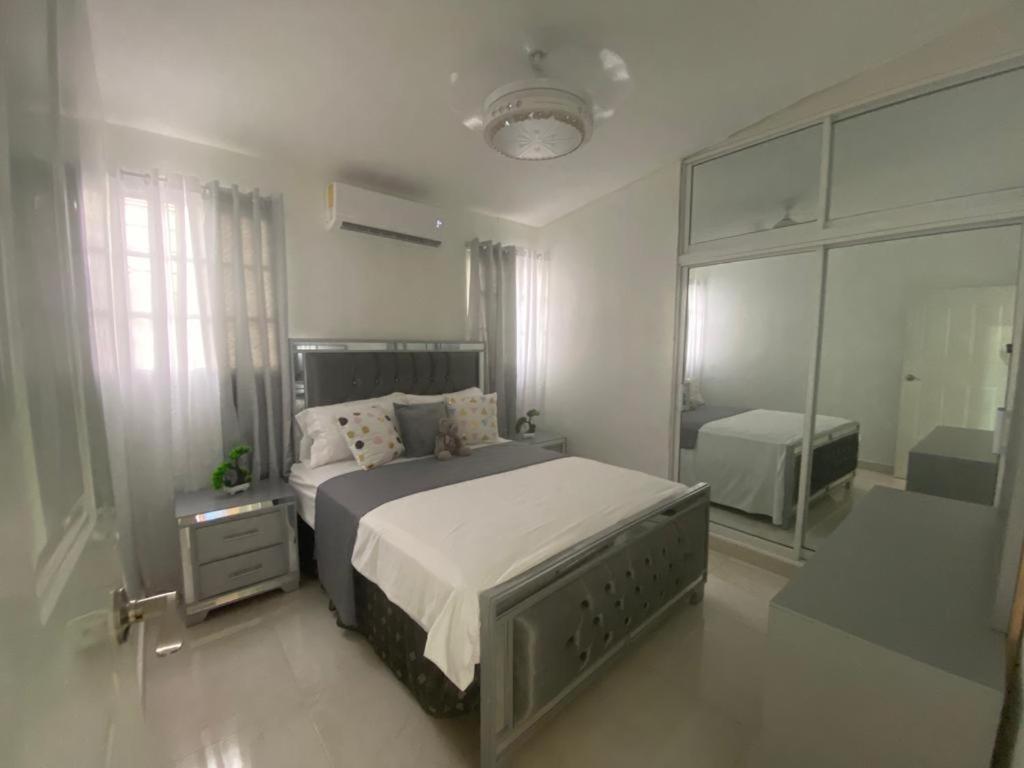 Postel nebo postele na pokoji v ubytování Luxury 3 bed apartment in Santiago De Los Caballeros