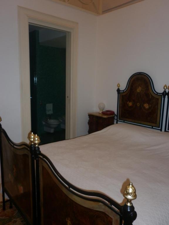 Łóżko lub łóżka w pokoju w obiekcie Lilla B&B