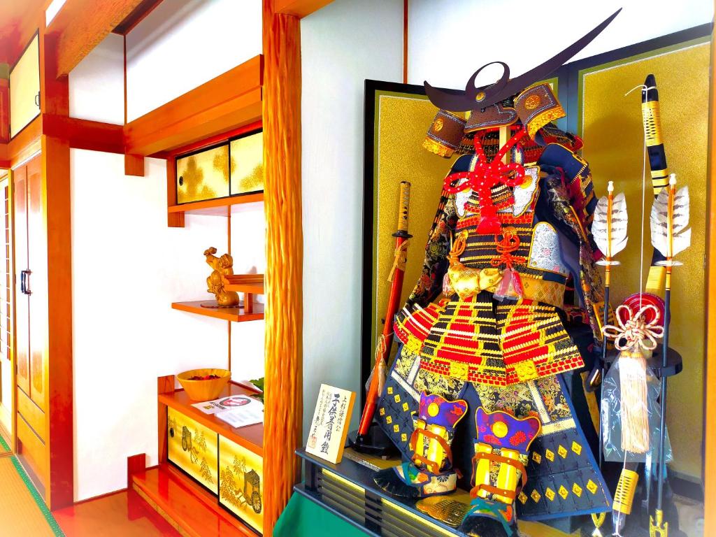 a display of a samurai suit in a museum at HS japan house in Ichiba