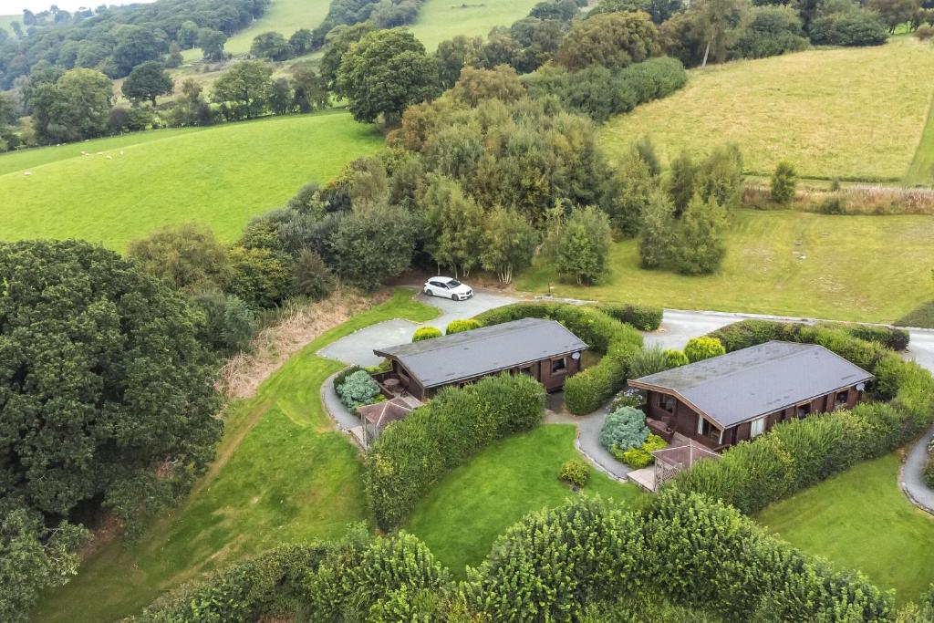an aerial view of a house in a field at Valley View in Rhayader