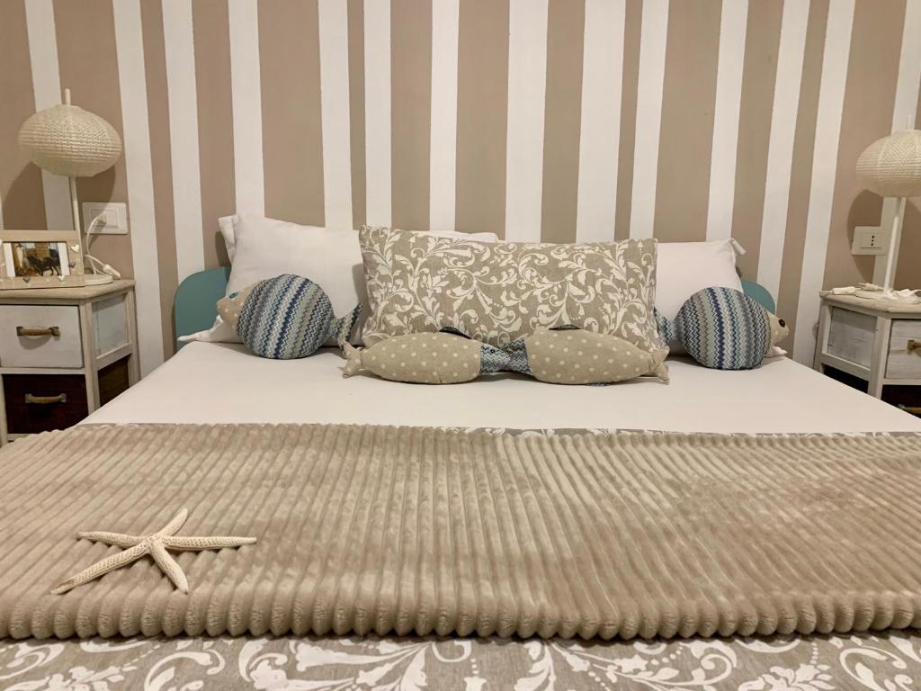 Postel nebo postele na pokoji v ubytování Cozzo Spadaro B&B