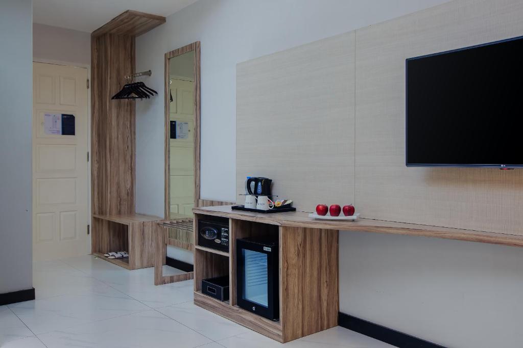 Kuchyň nebo kuchyňský kout v ubytování Aston Inn Tasikmalaya