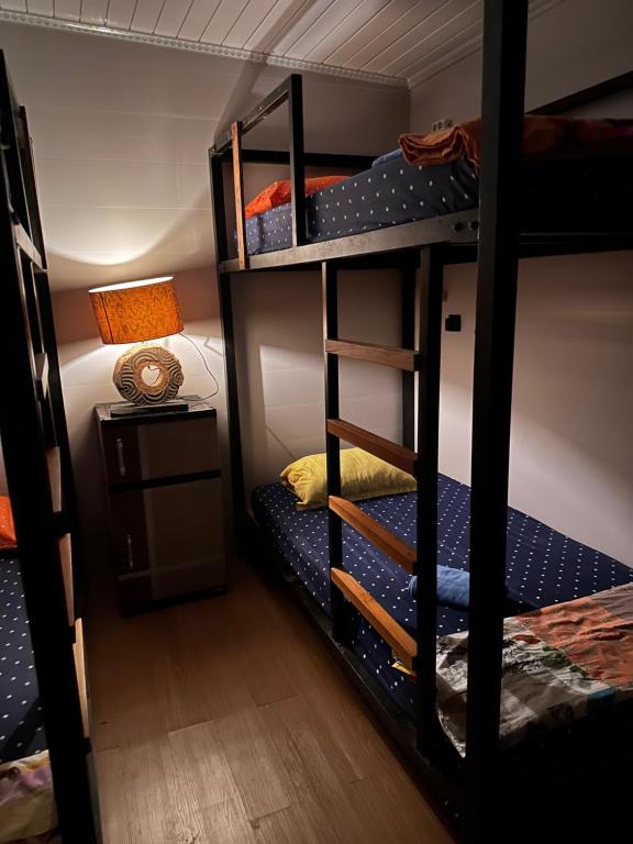 Postel nebo postele na pokoji v ubytování Atlante Hostel
