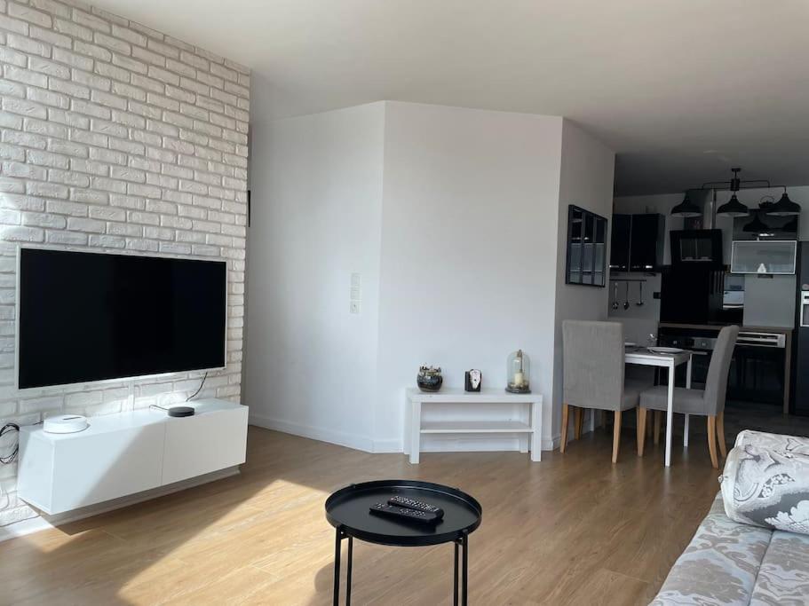 Televisyen dan/atau pusat hiburan di Appartement 3p Ivry