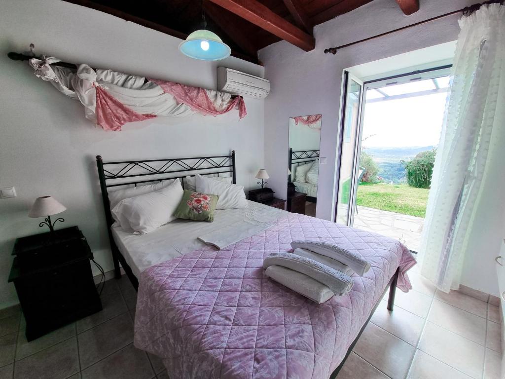 Postel nebo postele na pokoji v ubytování Forestata Village
