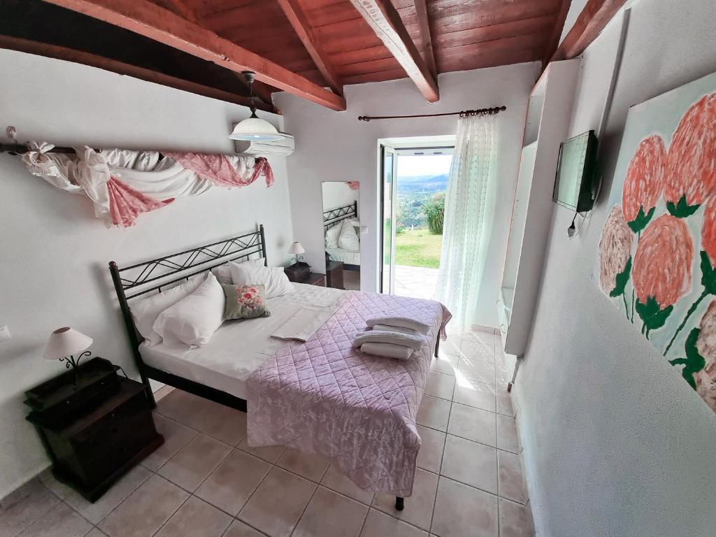 Postel nebo postele na pokoji v ubytování Forestata Village