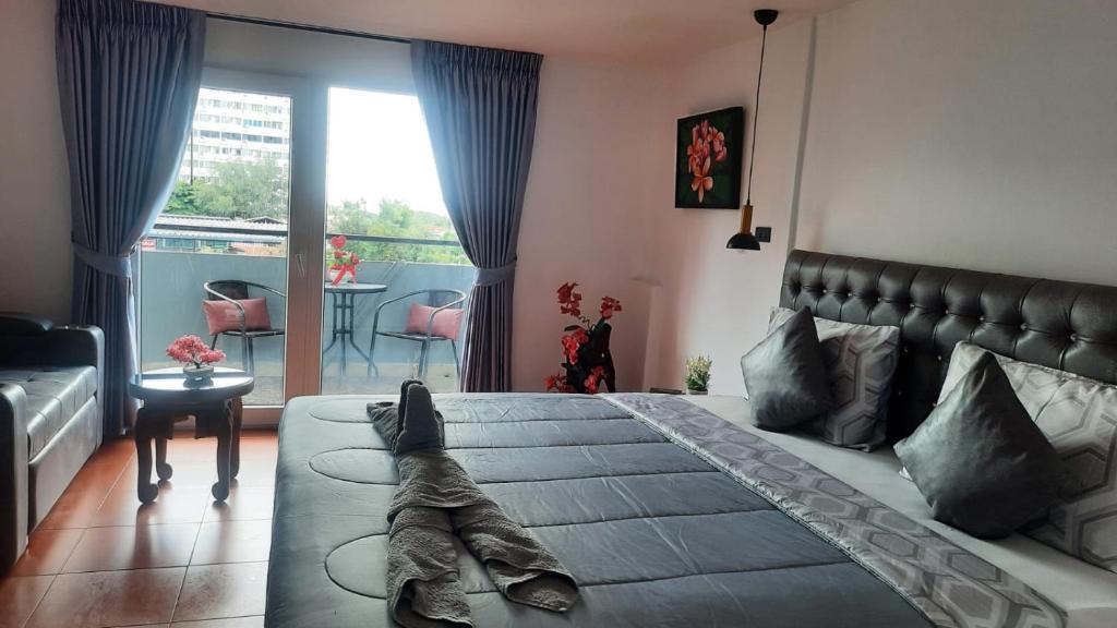 Happy Beach Jomtien Guesthouse - Resim 28