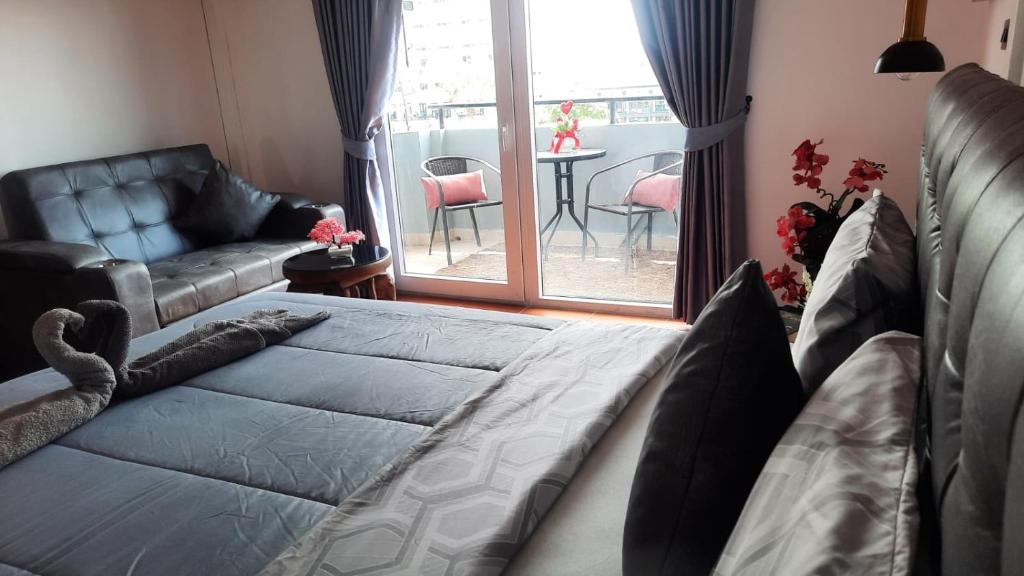 Happy Beach Jomtien Guesthouse - Resim 31