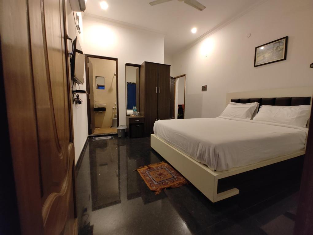 A bed or beds in a room at DKV Beach View