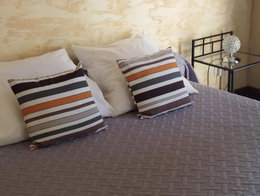 Postel nebo postele na pokoji v ubytování Logis Hotel Restaurant L'Esquielle